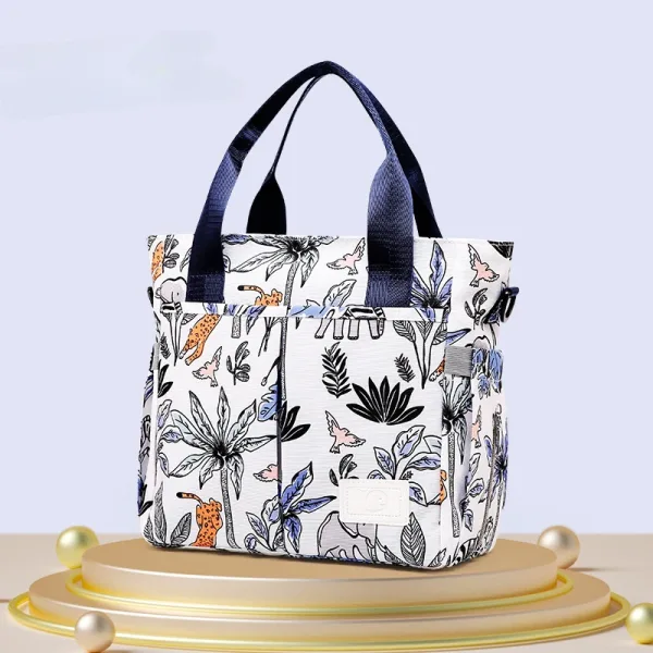 sac à langer à bandoulière floral blanc et noir